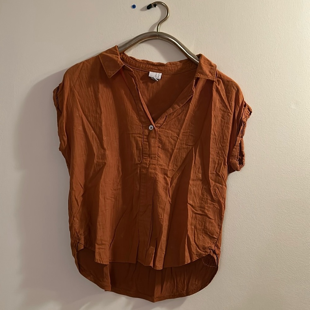Orange blouse.